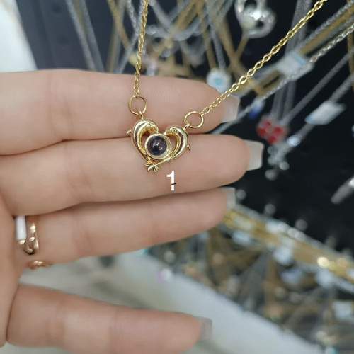 گردنبندهای تلسکوپی صدزبان(داخل نگین دوست دارم به صد زبان نوشته شده)