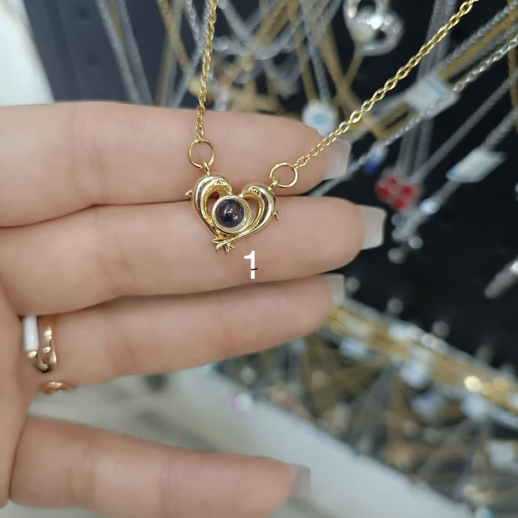 گردنبندهای تلسکوپی صدزبان(داخل نگین دوست دارم به صد زبان نوشته شده)