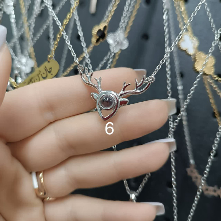 گردنبندهای تلسکوپی صدزبان(داخل نگین دوست دارم به صد زبان نوشته شده)